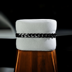 Shiny Black Chain Bracelet on Stand